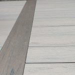 Close up of new, maintenance free decking in tan.